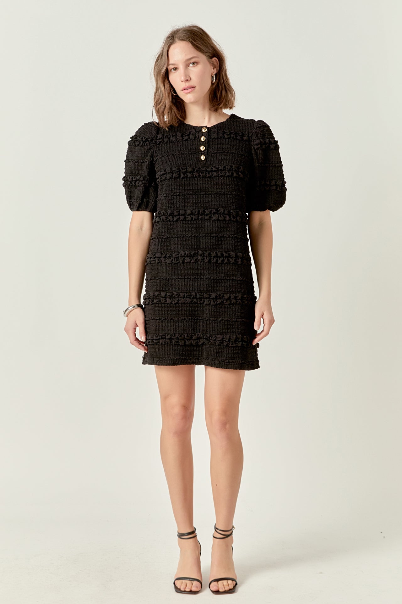 Black smocked mini dress