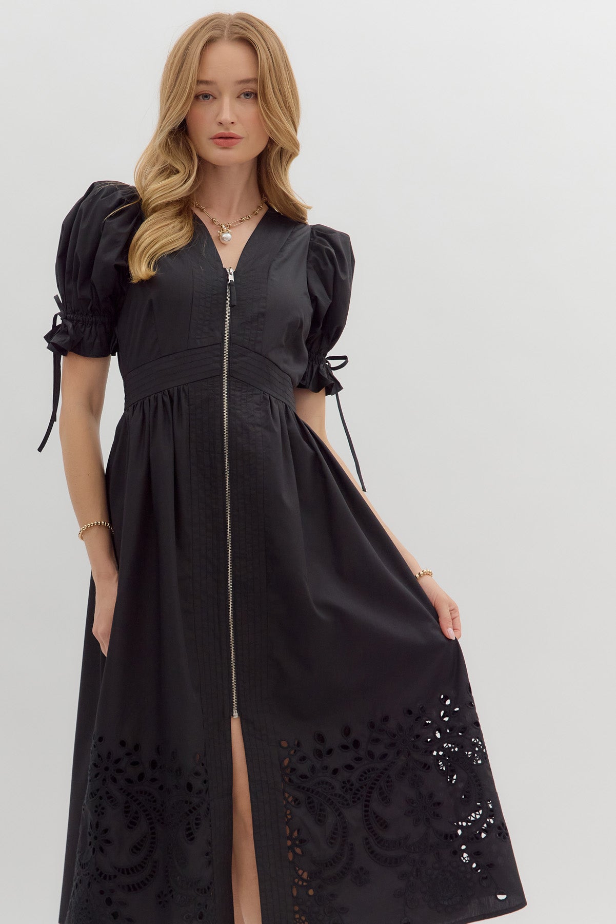 Black dress with eyelet detail