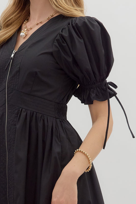 Black dress with eyelet detail
